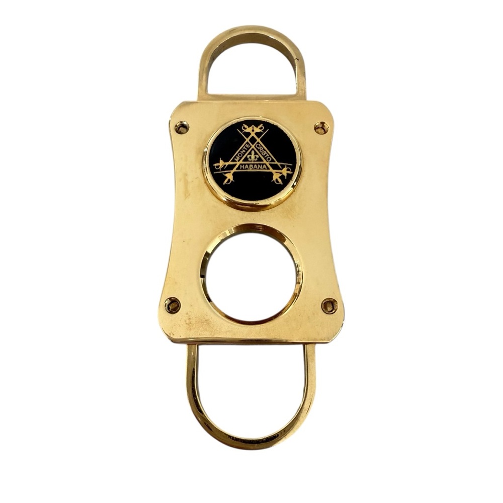 Montecristo gold tone cigar cutter preowned